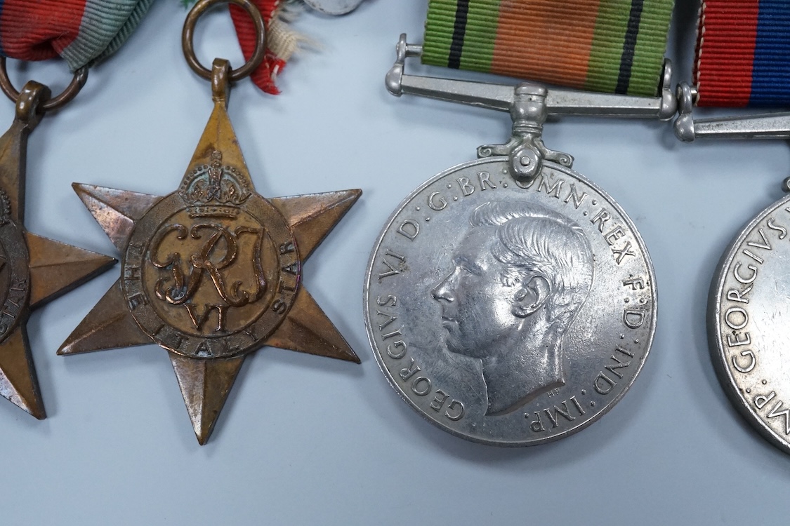 A WWII medal group awarded to Fg. Off. A.J. Fransella R.A.F., comprising of five medals including the Defence Medal, the 1939-1945 Medal, the Italy Star, the 1939-1945 Star and the General Service Medal with clasp for Pa